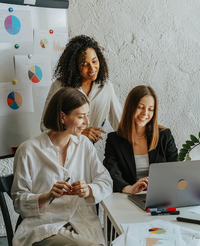 3 people working together